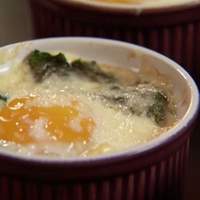 Baked Eggs with Canadian Bacon, Spinach, and Aged Cheddar Recipe