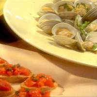 Braised Clams in Parsley Broth, Peas and Bruschetta with Tomatoes and Fried Capers Recipe