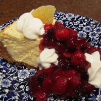 Festive Creamy Cheesecake With Tangy Cranberry Topping! Recipe