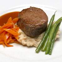 Filet Mignon over Lobster Boursin Mashed Potatoes with a Merlot Reduction Recipe