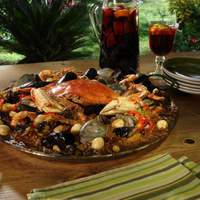 Fire Pit Paella with Portuguese Sausage, Crab and Escargot Recipe
