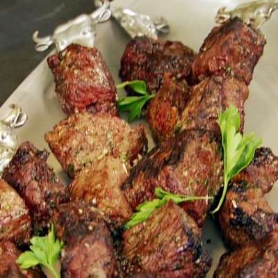 Argentinean Skewers with Sherry Vinegar Steak Sauce and Grilled Scallions - RecipeNode.com