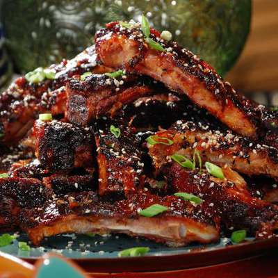 Asian Spice Rubbed Ribs with Pineapple-Ginger BBQ Sauce and Black and White Sesame Seeds - RecipeNode.com