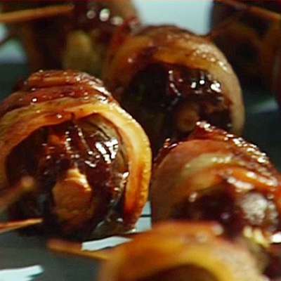 Bacon-Wrapped Dates Stuffed with Cream Cheese and Almonds - RecipeNode.com