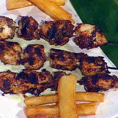 Bob Marley's Reggae: Jerk Marinated Chicken Breast Skewers, Chargrilled and Served with Creamy Cucumber Dipping Sauce and Yucca Fries - RecipeNode.com