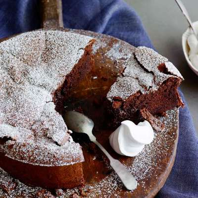 Cracked Chocolate Earth with Whipped Cream (Flourless Chocolate Cake) - RecipeNode.com