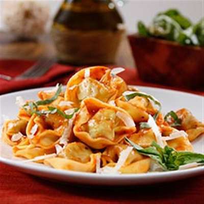 Three Cheese Tortellini with Traditional Sauce and Parmigiano Cheese  - RecipeNode.com