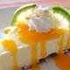 Coconut-Lime Cheesecake with Mango Coulis