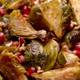 Roasted Brussels Sprouts with Pomegranates and Vanilla-Pecan Butter